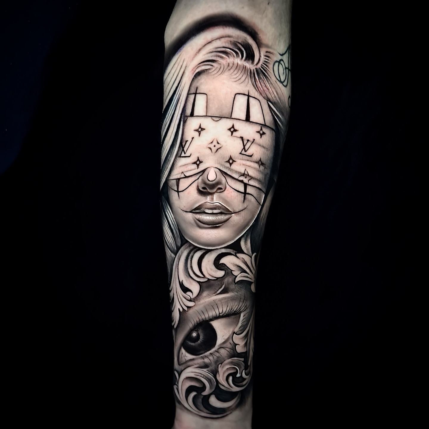 Woman's face realism tattoo on the forearm by Tattoo Artist - the Goat
