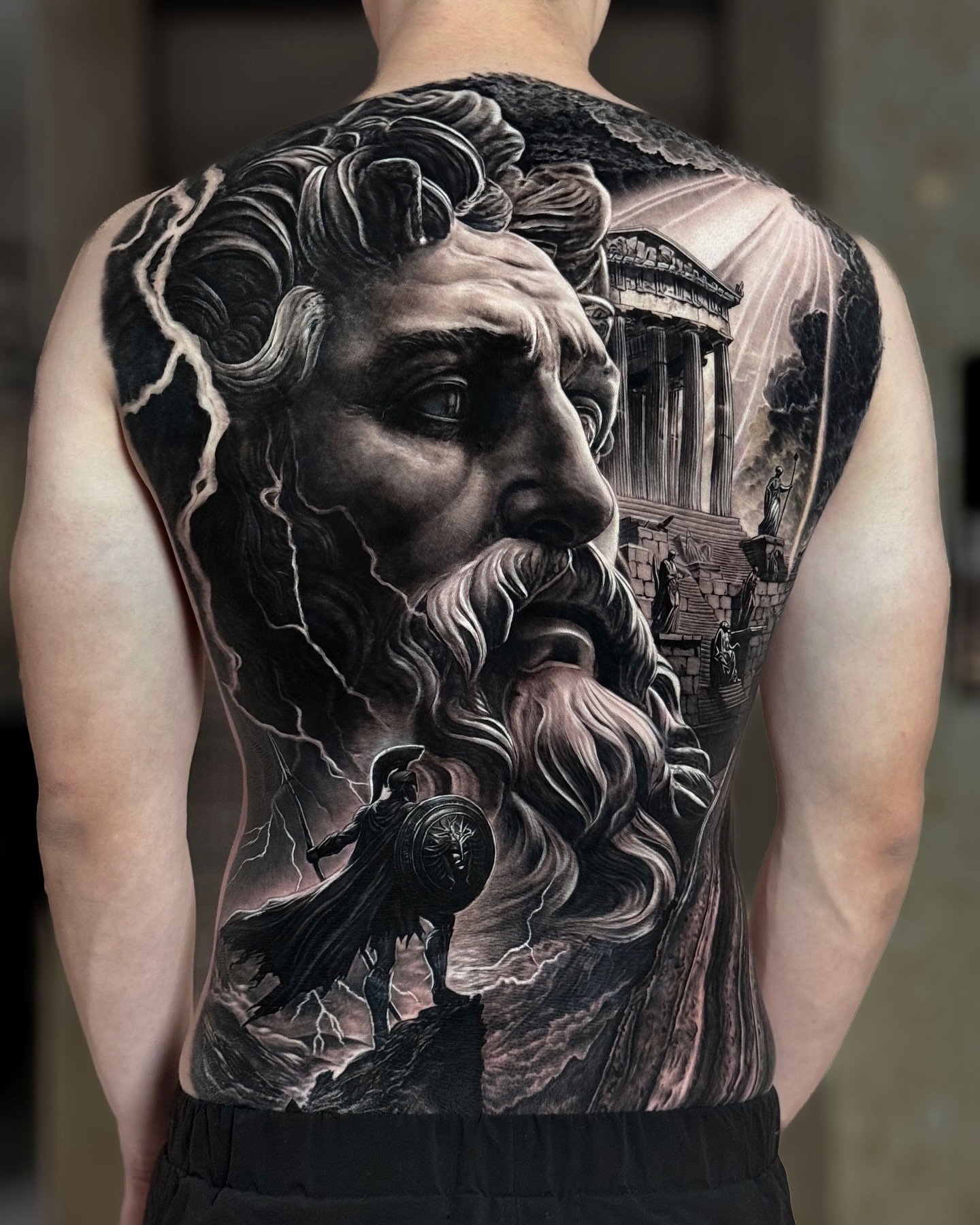 Zeus realism tattoo on the back by Bình Nguyễn
