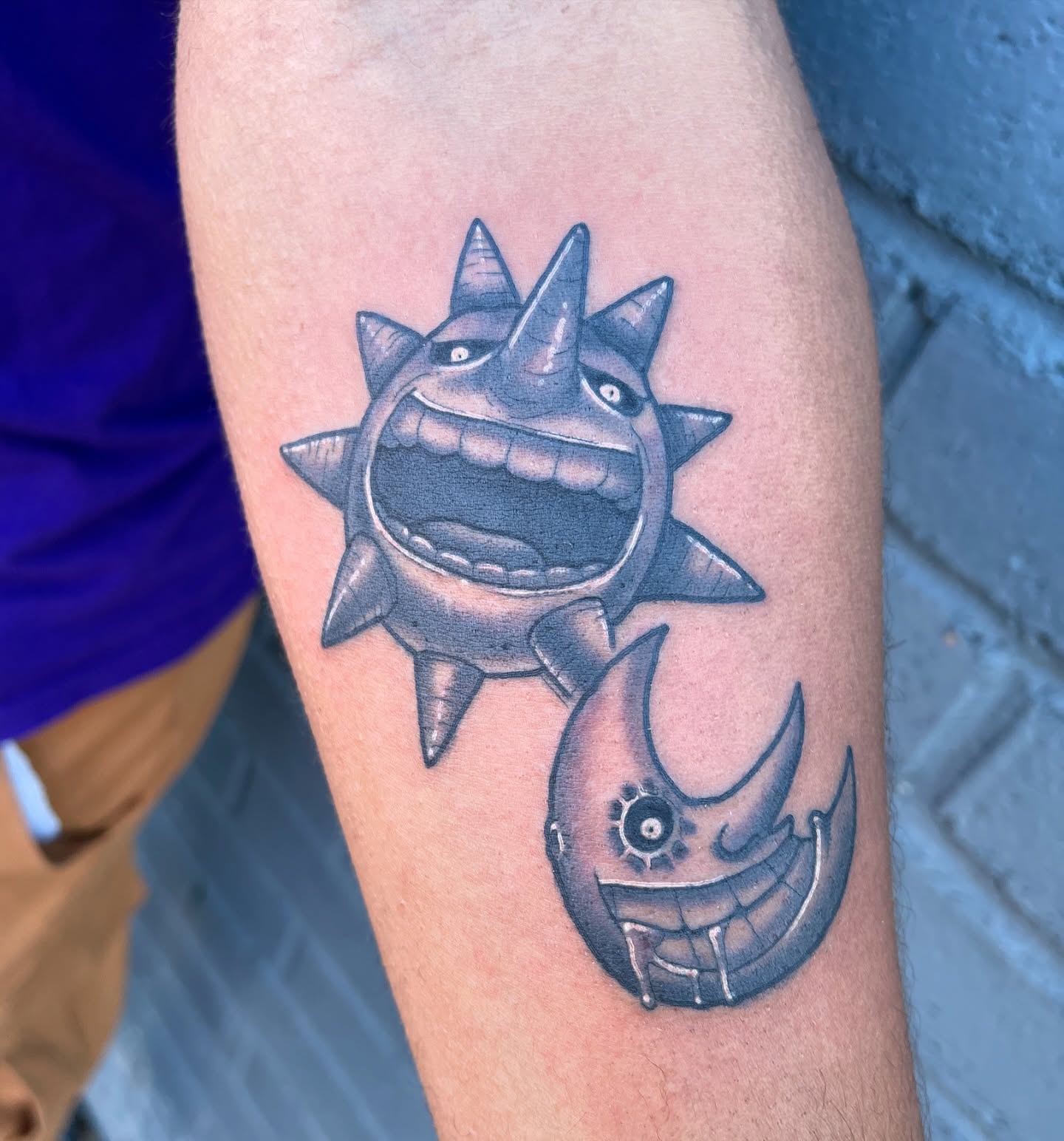 Sun and moon black and grey tattoo on the forearm by Chris Sparks, I just go by Sparks.