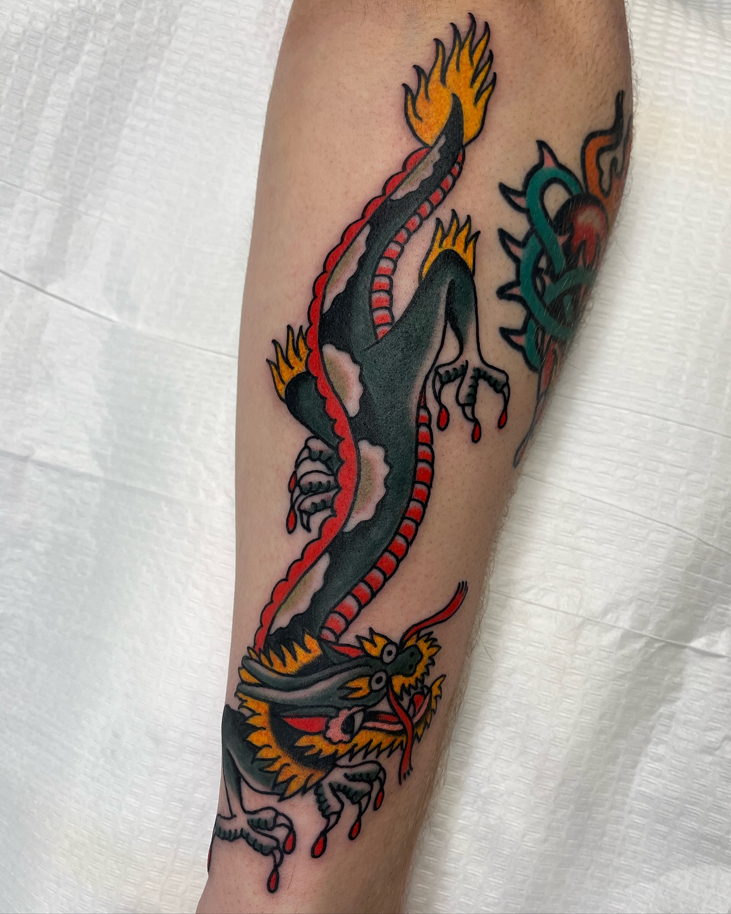 Dragon American traditional tattoo on the forearm by 🌞all Bodies Welcome🌞