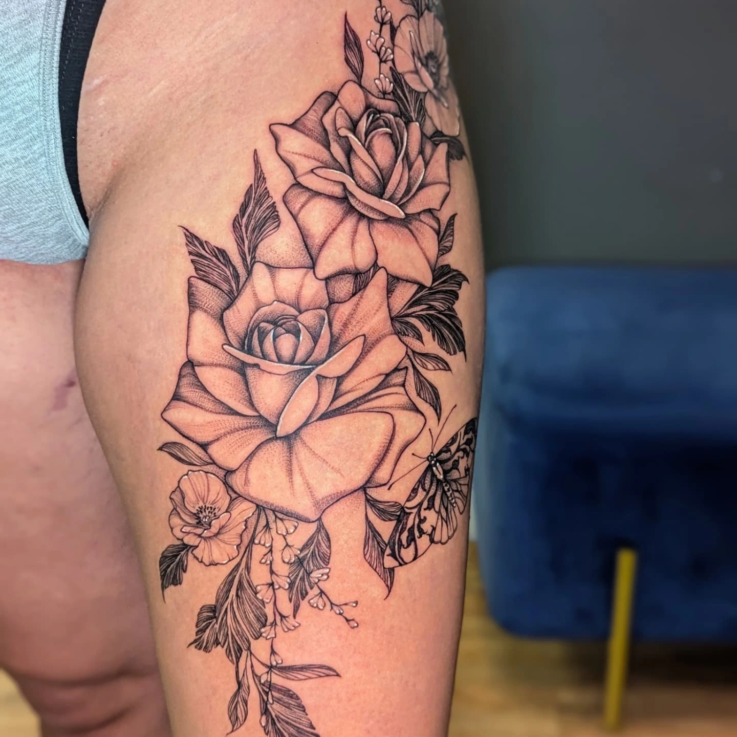 Roses realism tattoo on the thigh by Bethany Jane Tattoos