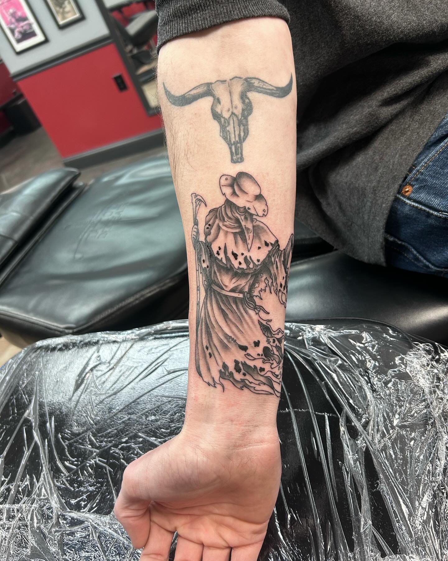 Cowgirl and bull skull realism tattoo on the forearm by Ricardo (RJ)