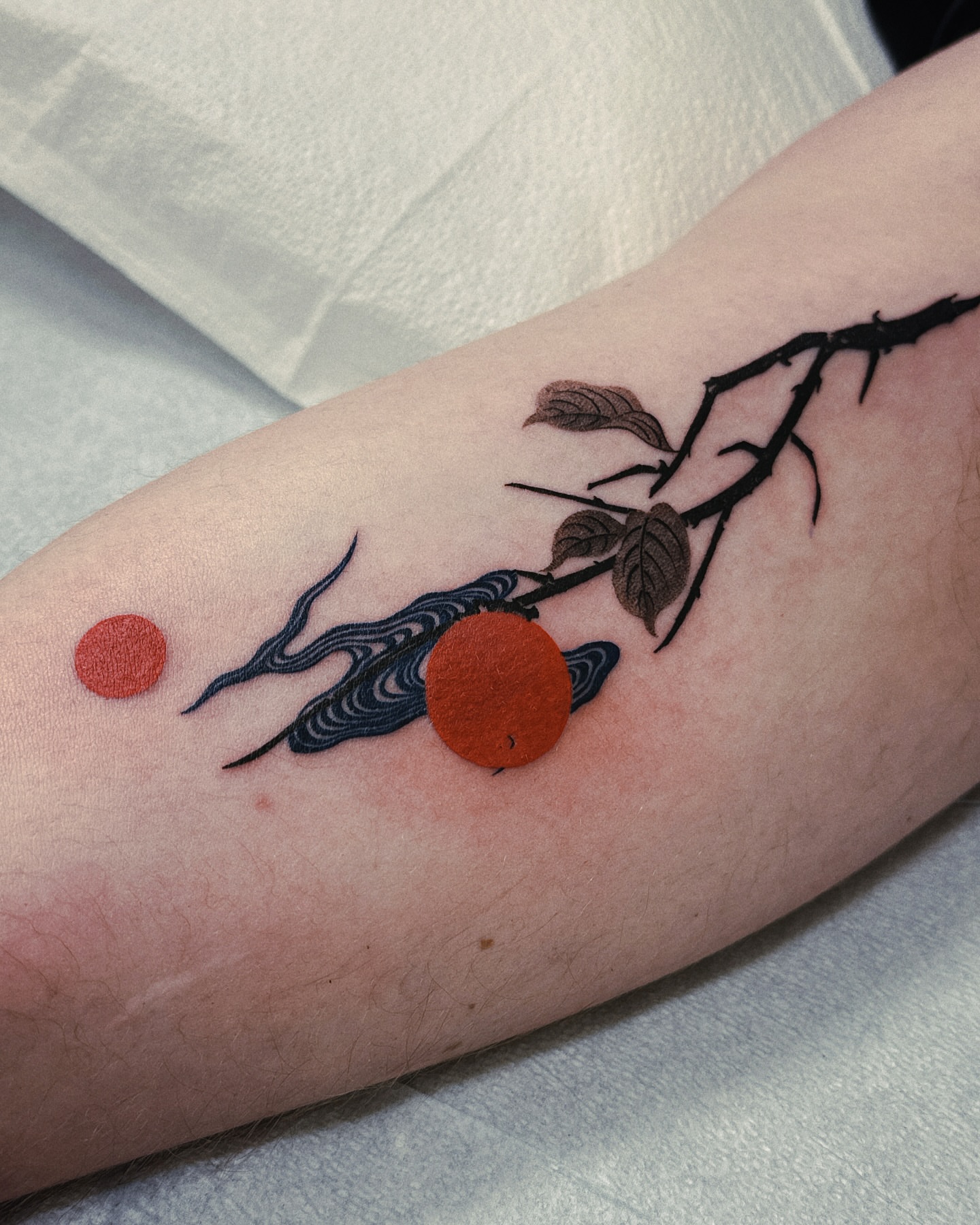 Sunset branch realism tattoo on the forearm by 비단, New York, New York