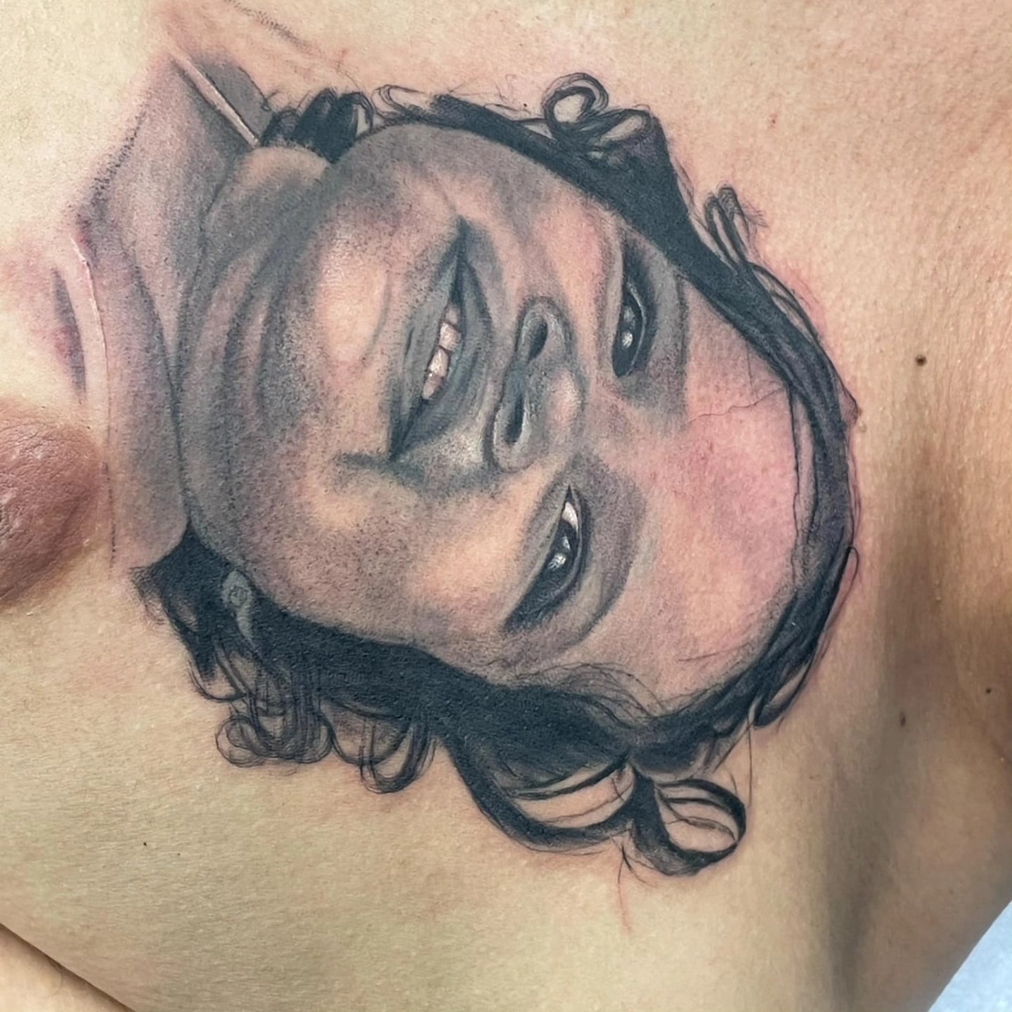 Portrait realism tattoo on the chest by Noriega Josué