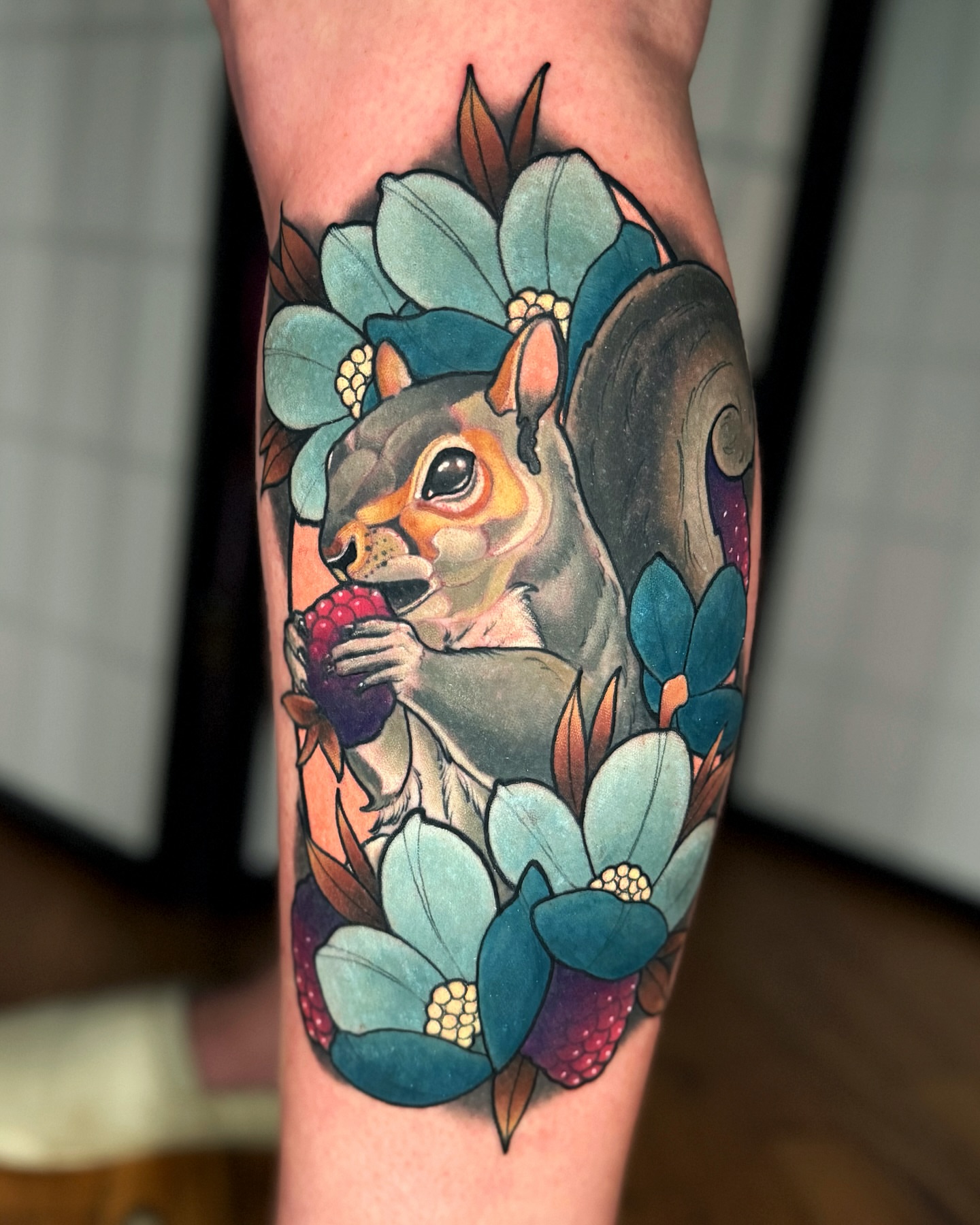 Squirrel with flowers realism tattoo on the forearm by Austin Britt