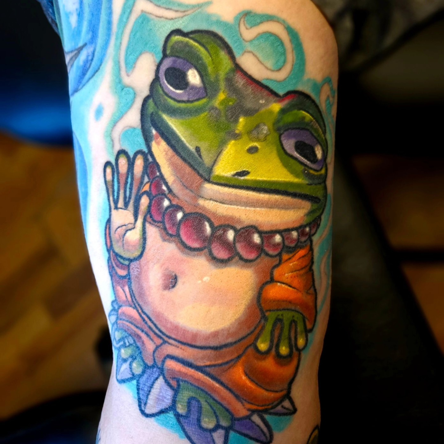 Frog realism tattoo on the forearm by Edward Argibay