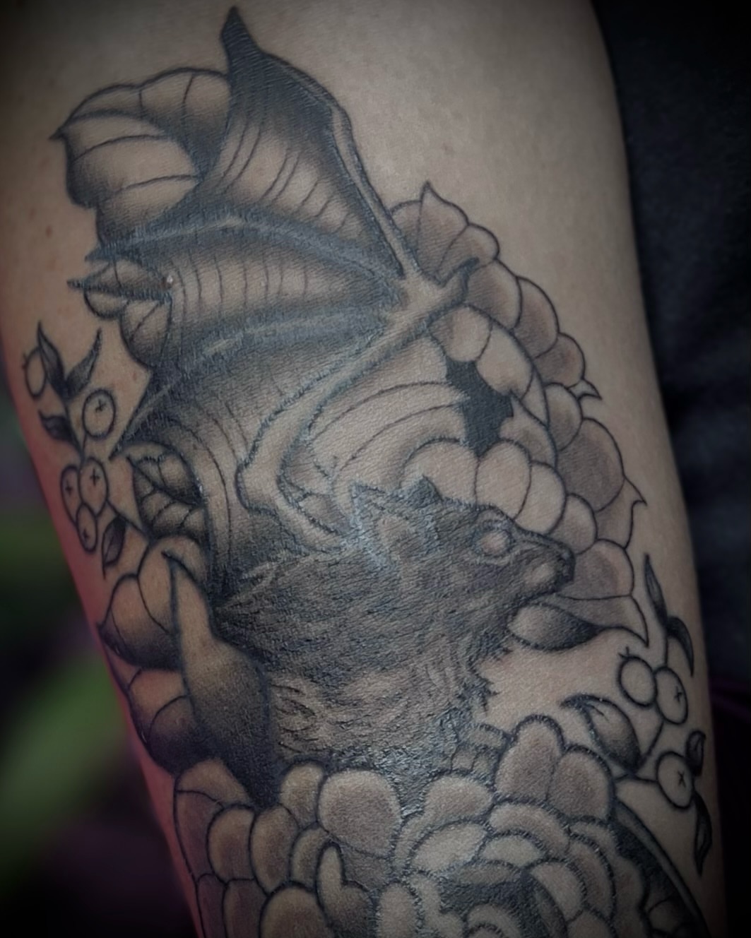 Bird and floral black and grey tattoo on the forearm by Shelbie, Salt Lake City, Utah