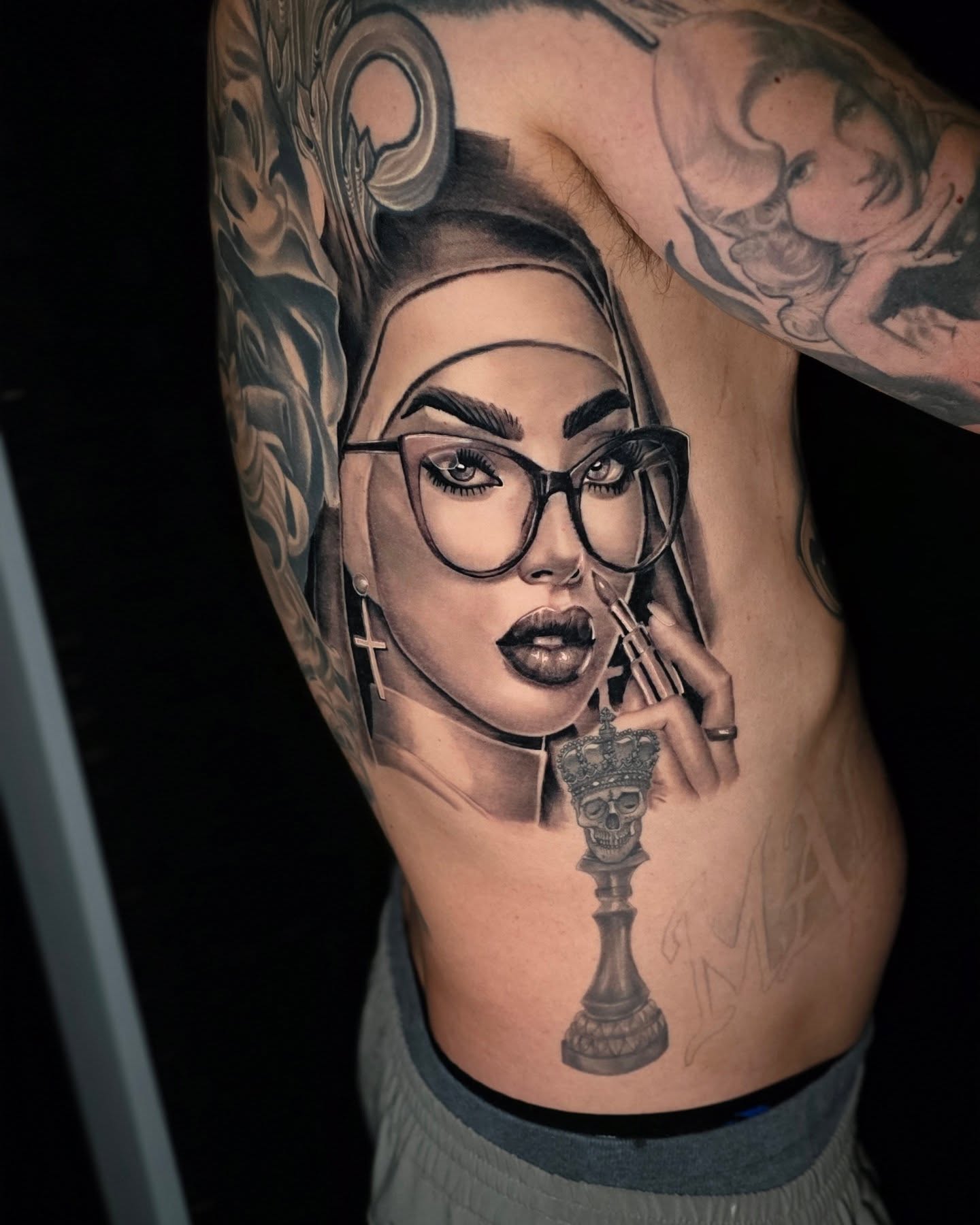 Tattoo by @gl_tattoos — realism, black_and_grey