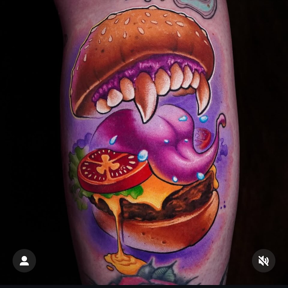 Hamburger illustrative tattoo on the forearm by Tim Stafford