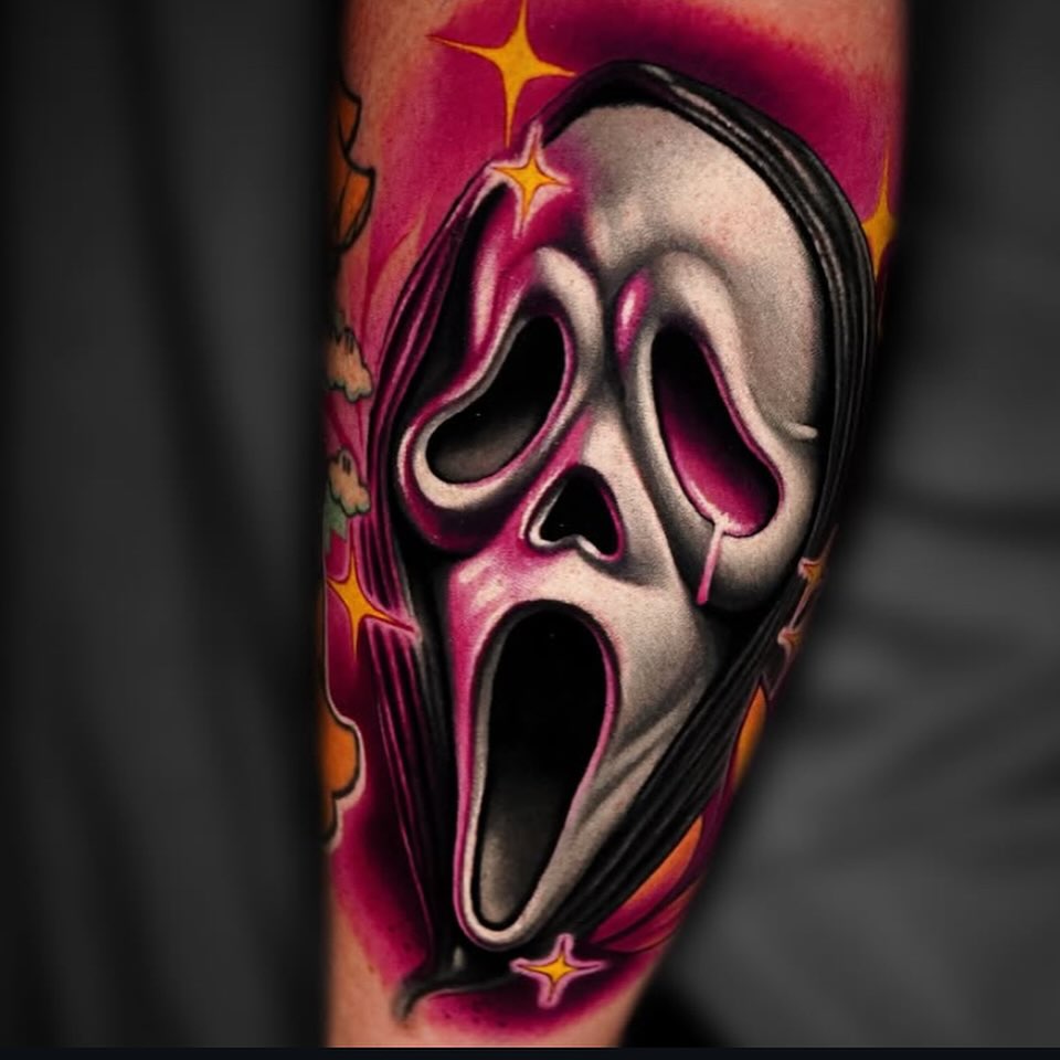 Scream mask realism tattoo on the forearm by Tim Stafford