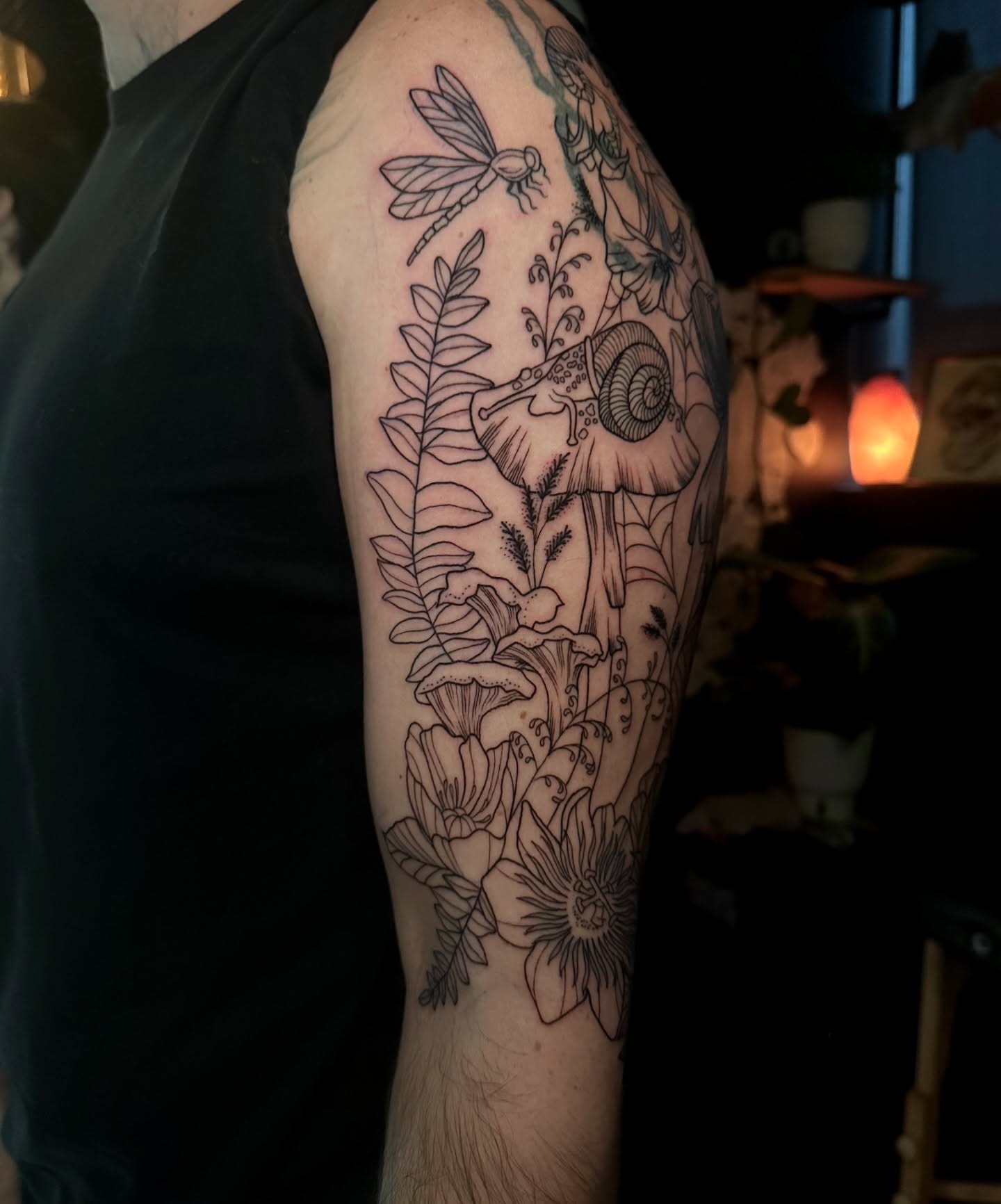 Mushroom and floral black and grey tattoo on the upper arm by Abby ✣ fineline and blackwork ✣
