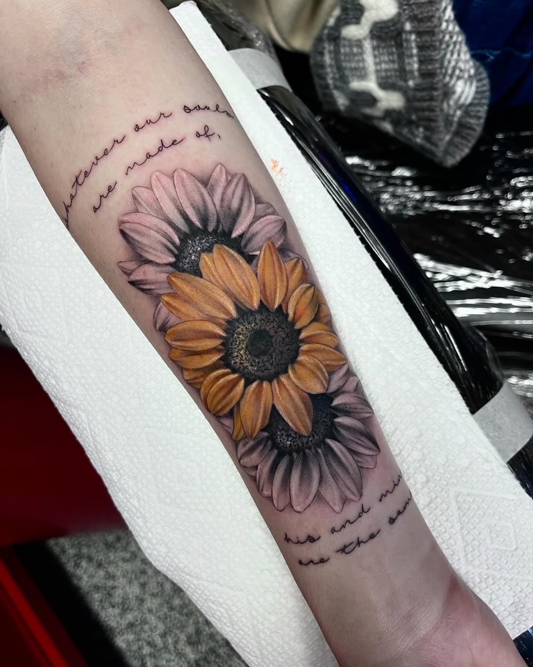 Sunflowers and script watercolor tattoo on the forearm by Jonathan Red