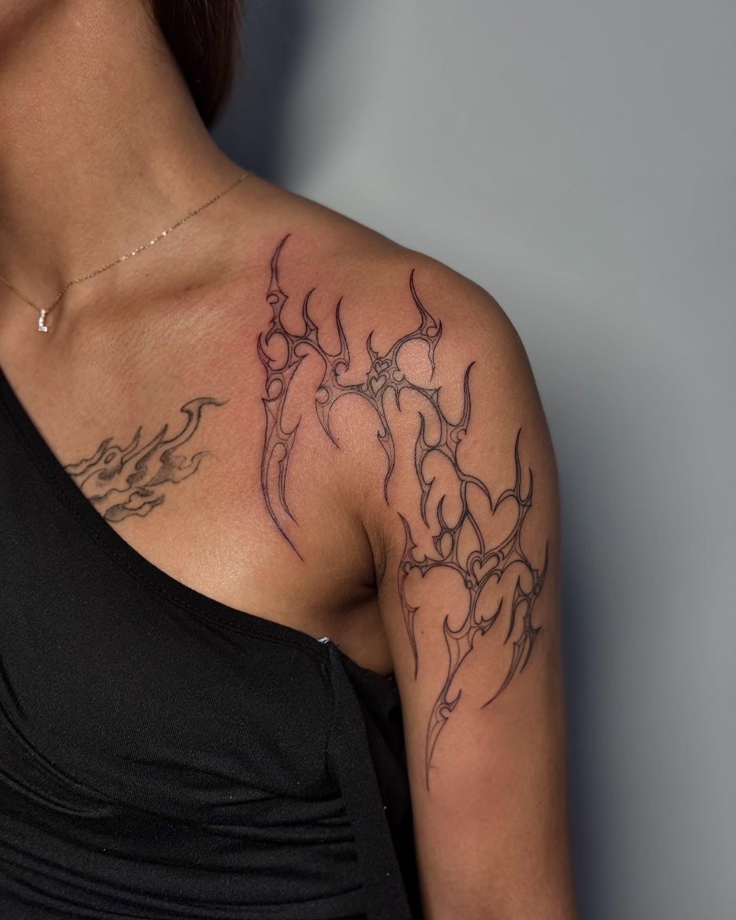 Flames tribal tattoo on the shoulder by Kbtattz