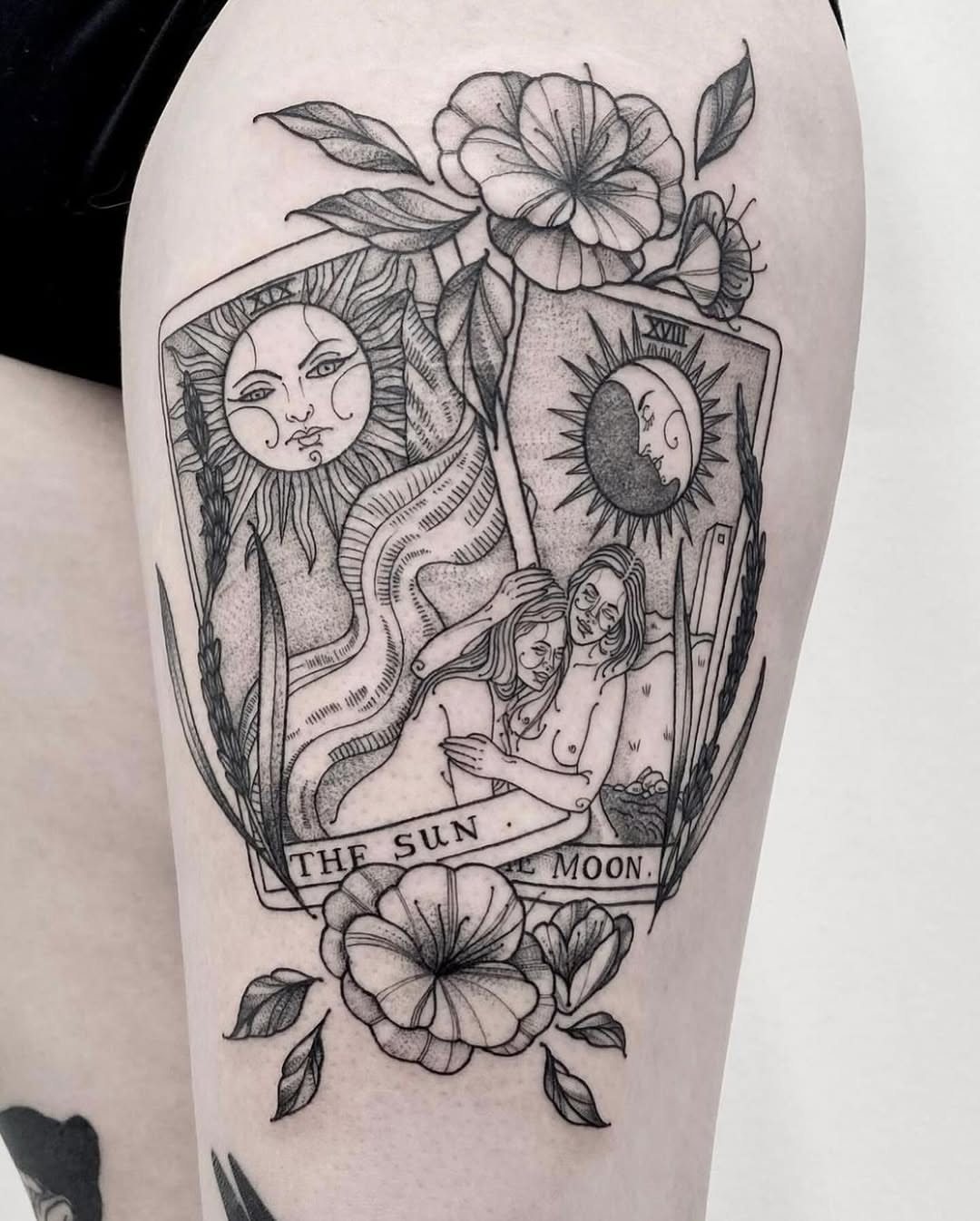 Sun and moon realism tattoo on the thigh by Rowan Starr