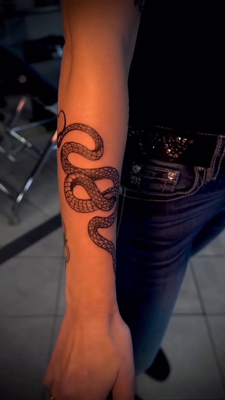 Snake realism tattoo by Greg Petrali