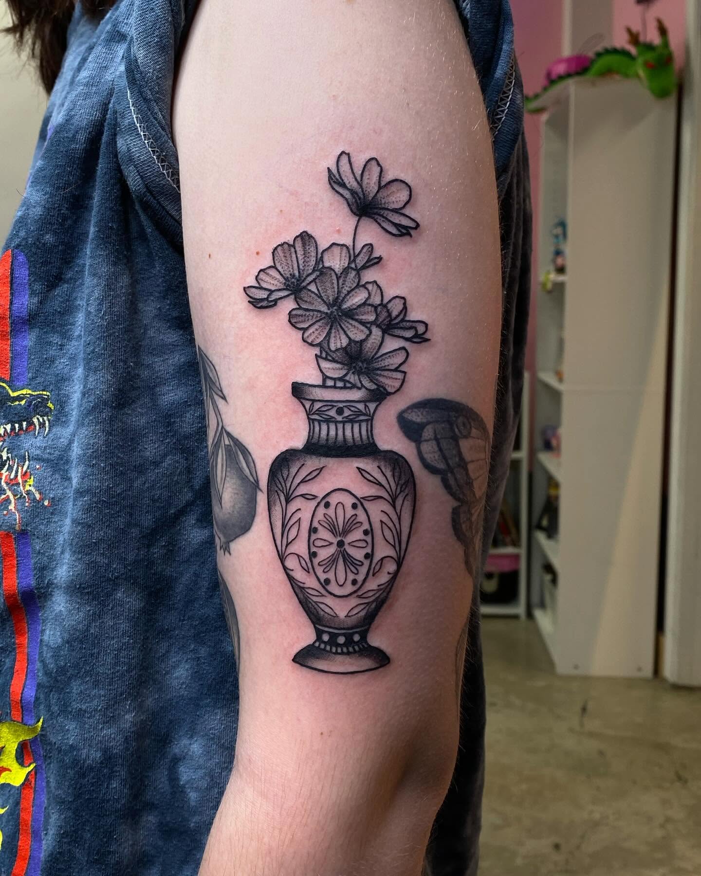 Vase with flowers black and grey tattoo on the forearm by @kaitlin.tattoos, Richmond, Virginia