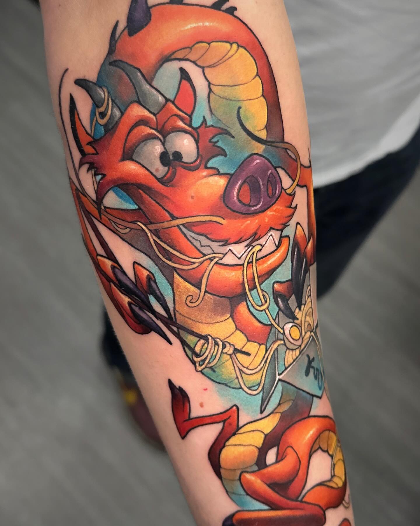 Pig dragon American traditional tattoo on the forearm by Lena Aleksandrova