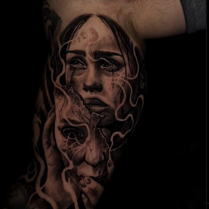 Woman's face realism tattoo on the forearm by Dark Shadows Tattoo