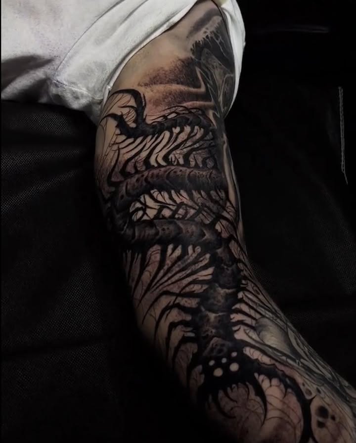 Spine realism tattoo on the forearm by Dark Shadows Tattoo