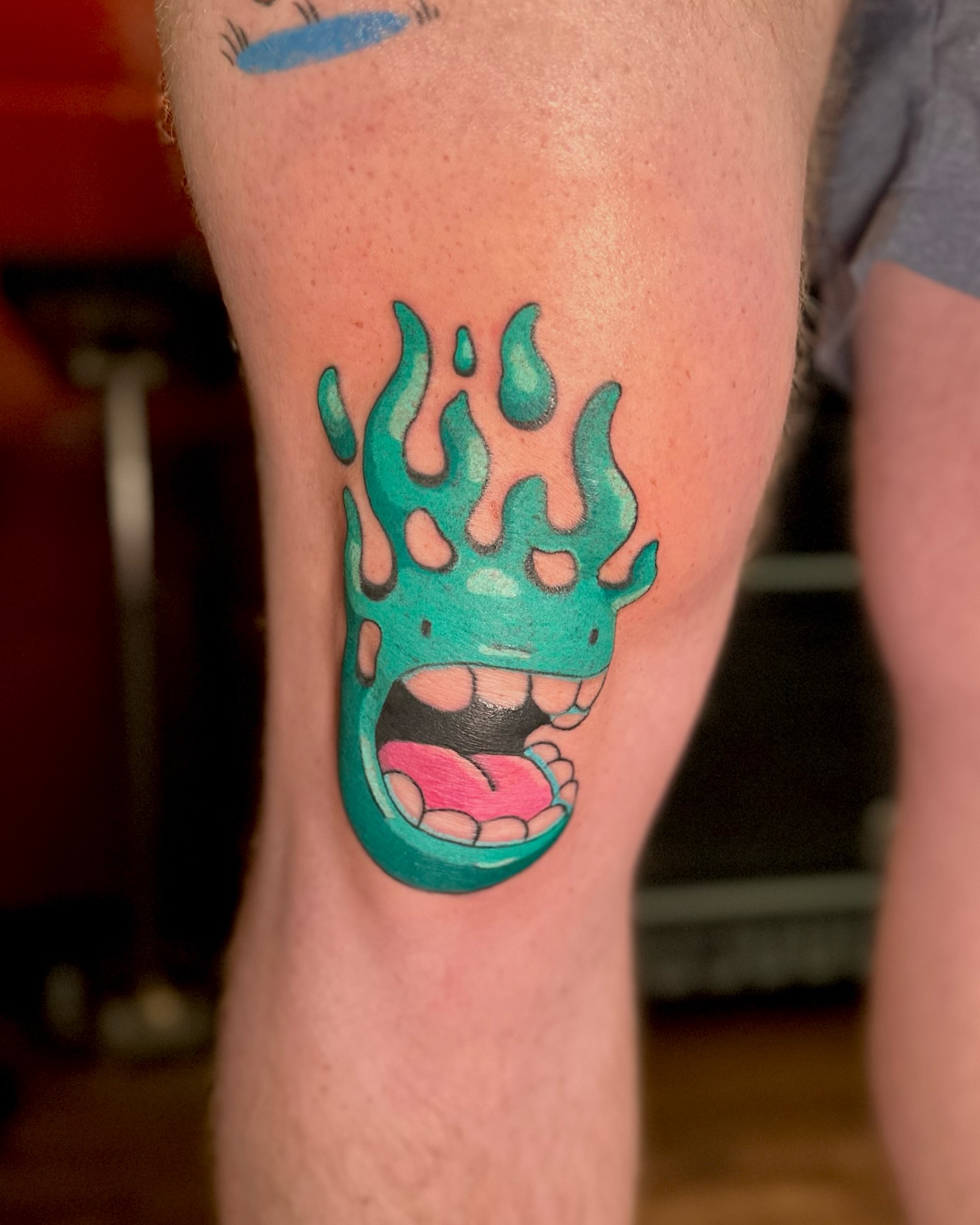 Flame new school tattoo on the leg by Kellie Burch