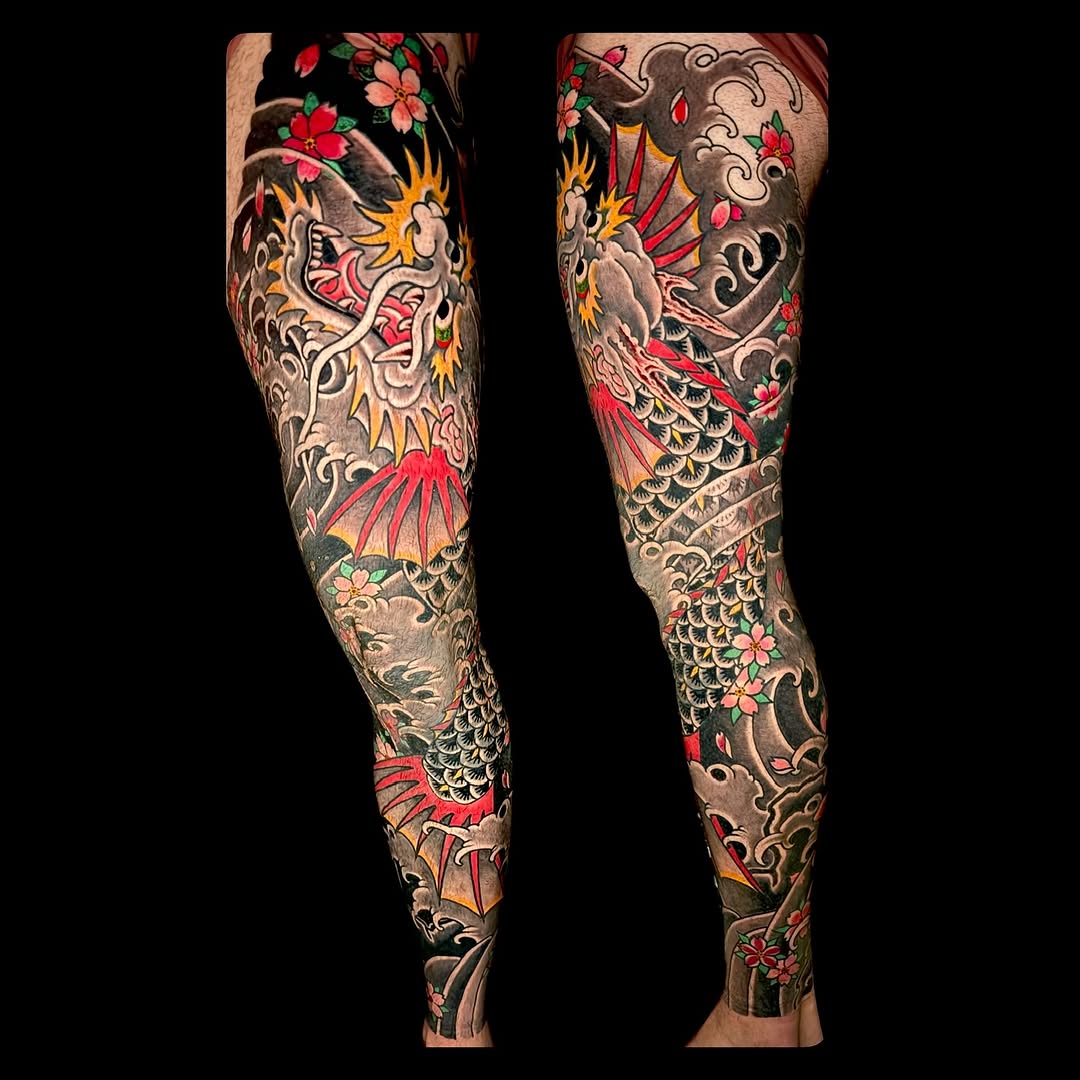Dragon and cherry blossoms Japanese tattoo on the leg by Leif Hansen