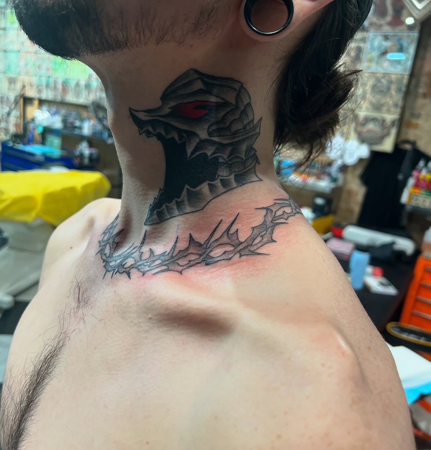 Dragon and crown realism tattoo on the neck by Baung Ben