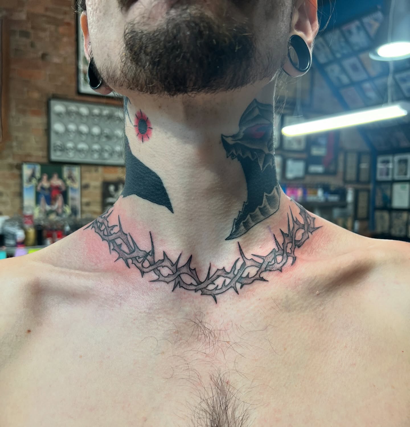 Crown of thorns black and grey tattoo on the neck by Baung Ben