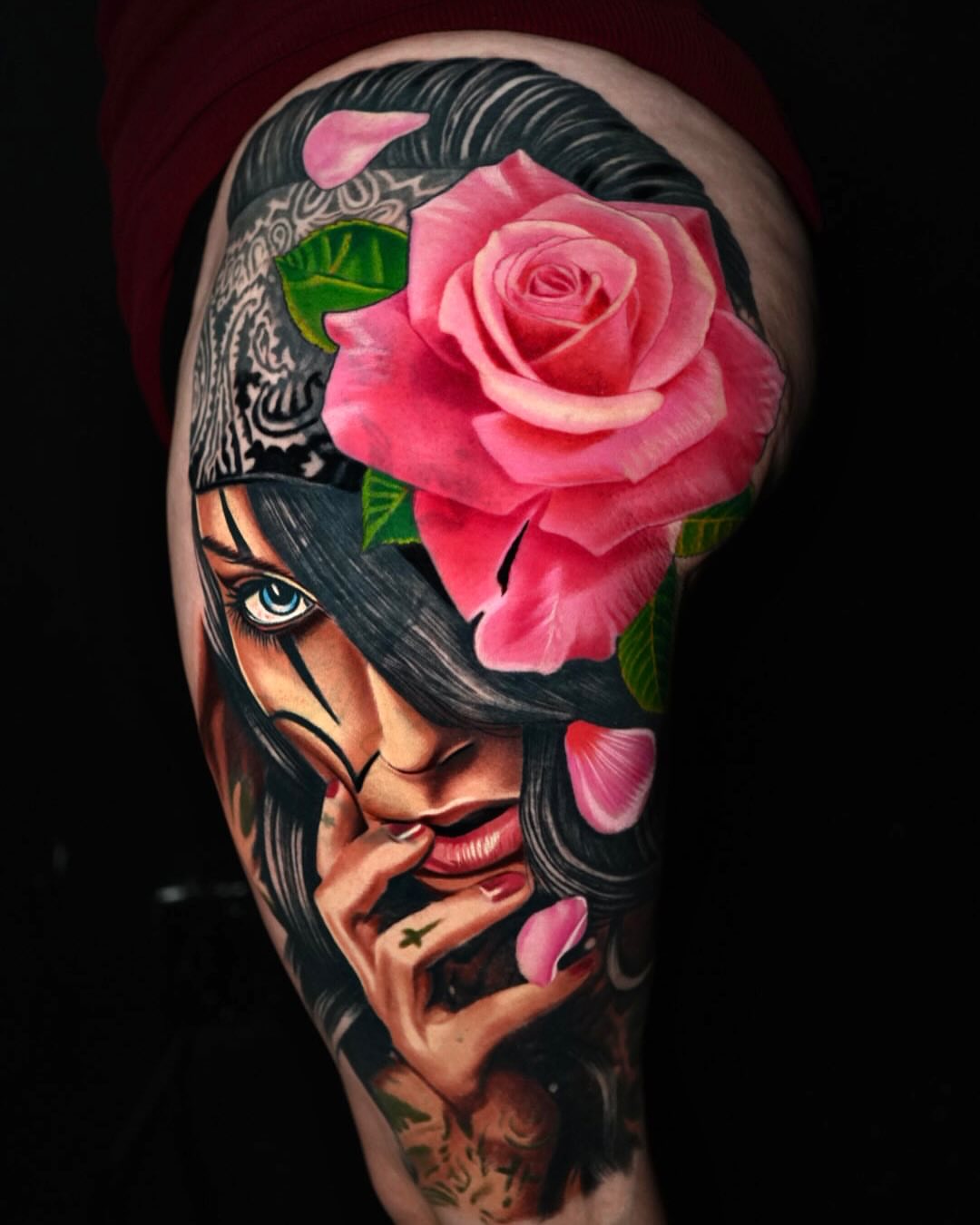 Woman with rose realism tattoo on the forearm by Sadier Alfonso