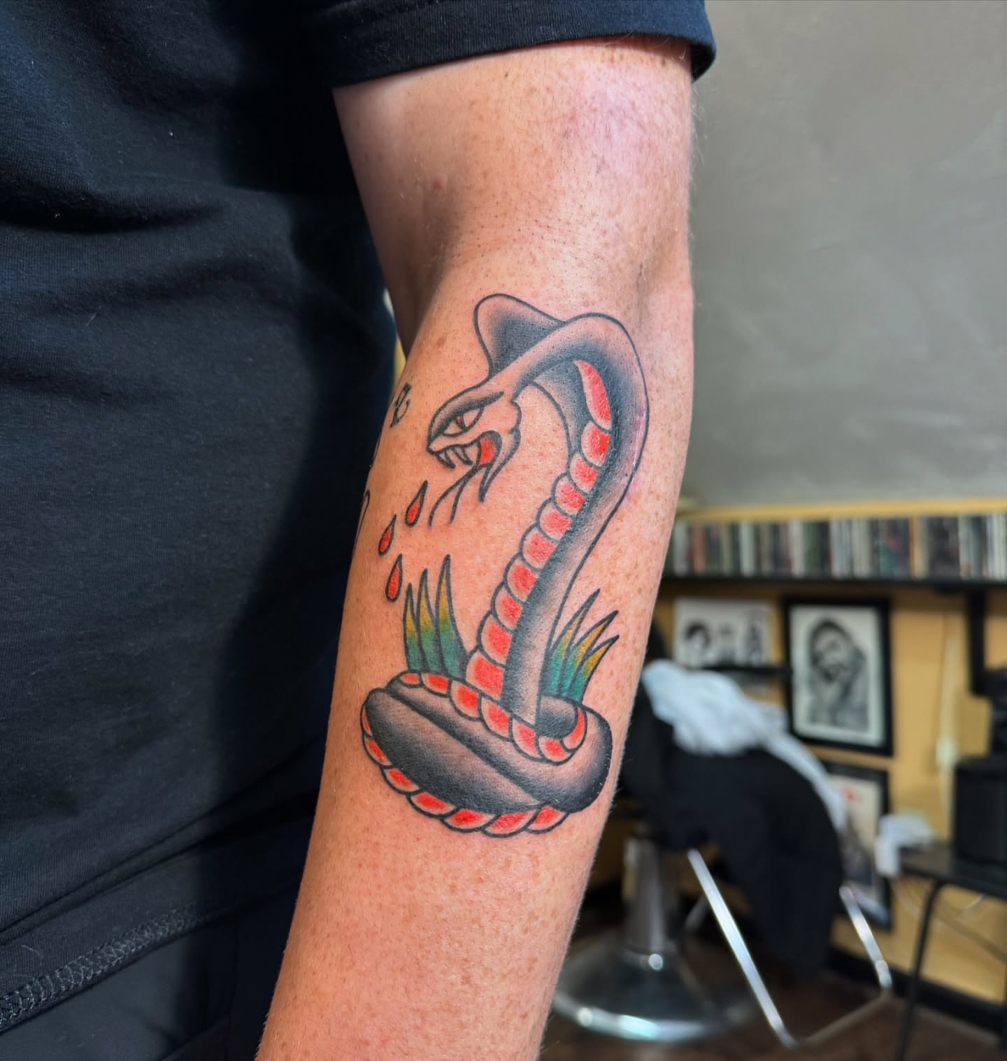 Snake American traditional tattoo on the forearm by Mazie
