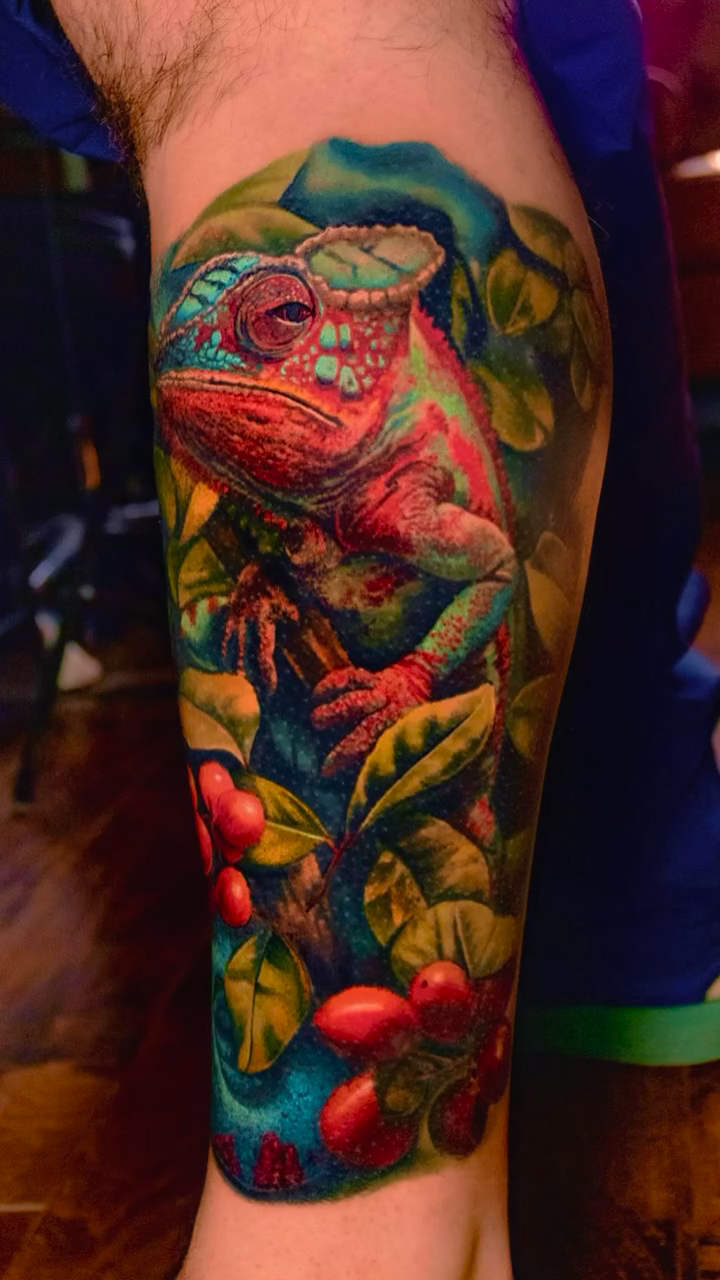 Chameleon and foliage realism tattoo by Austin tattoo artist