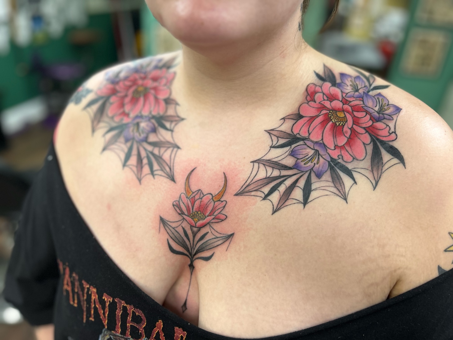 Floral arrangement American traditional tattoo on the chest by Patricia Cunningham
