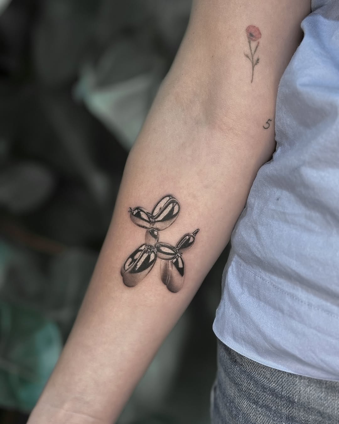 Balloon dog realism tattoo on the forearm by โ๏ธ Dima Sova โ๏ธ Tattoo ๐บ๐ธ Arlington VA