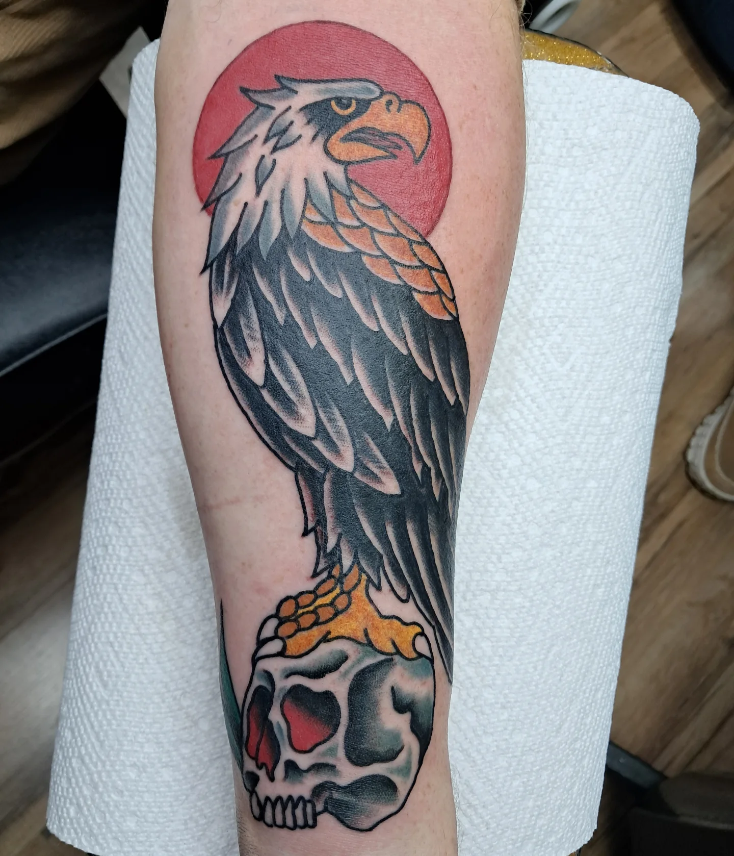 Eagle and skull American traditional tattoo on the forearm by Reb Fularz