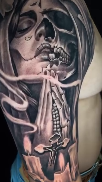 Skull and praying hands dark realism tattoo by Vic