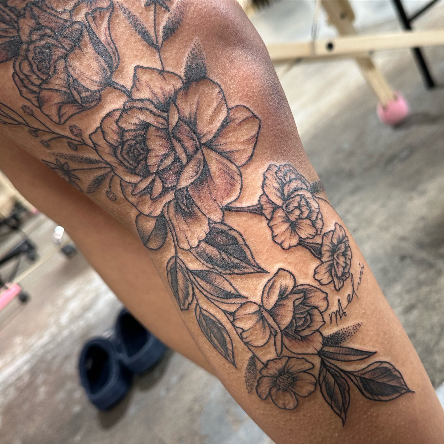Floral bouquet black and grey tattoo on the forearm by Emily K Lingg