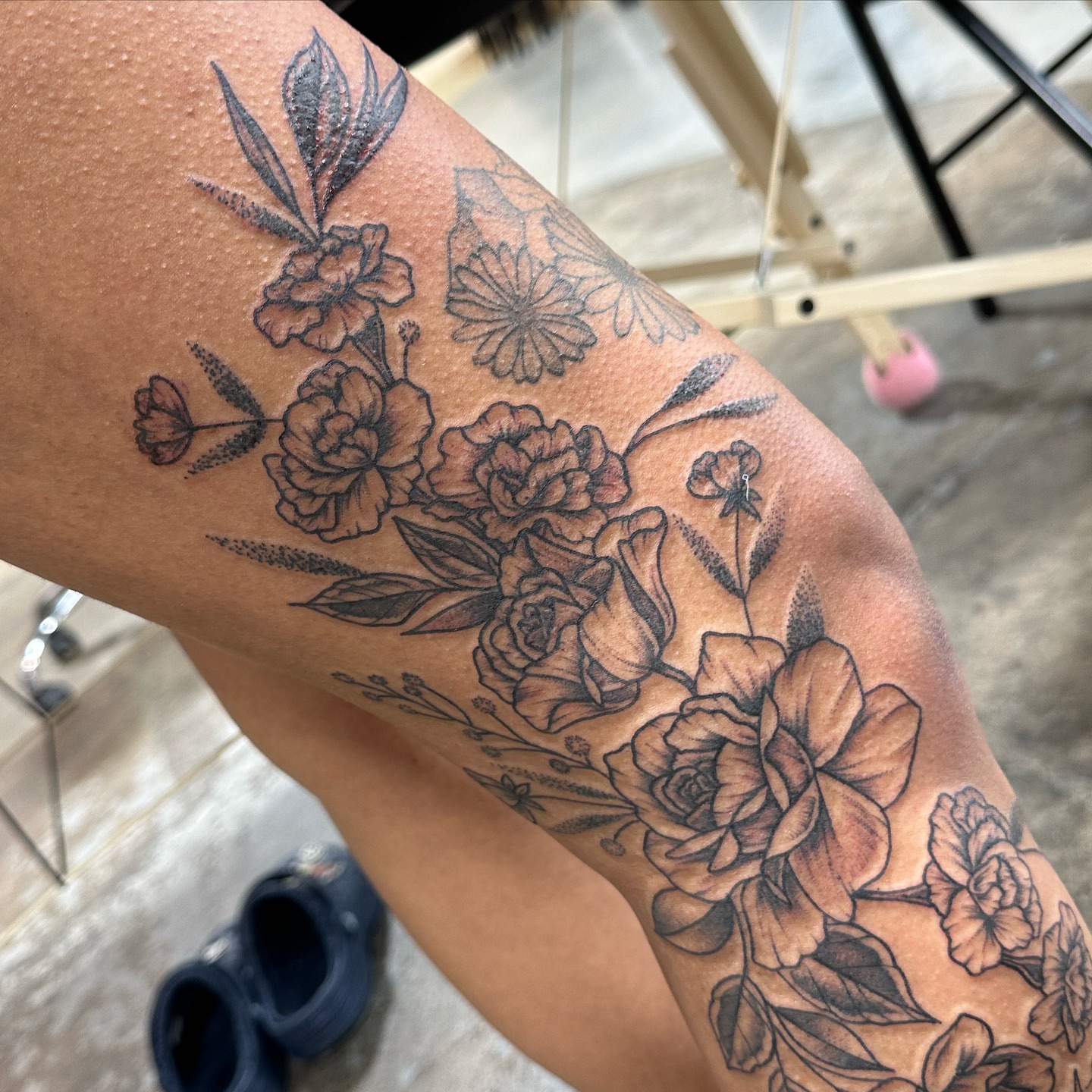 Floral bouquet black and grey tattoo on the forearm by Emily K Lingg