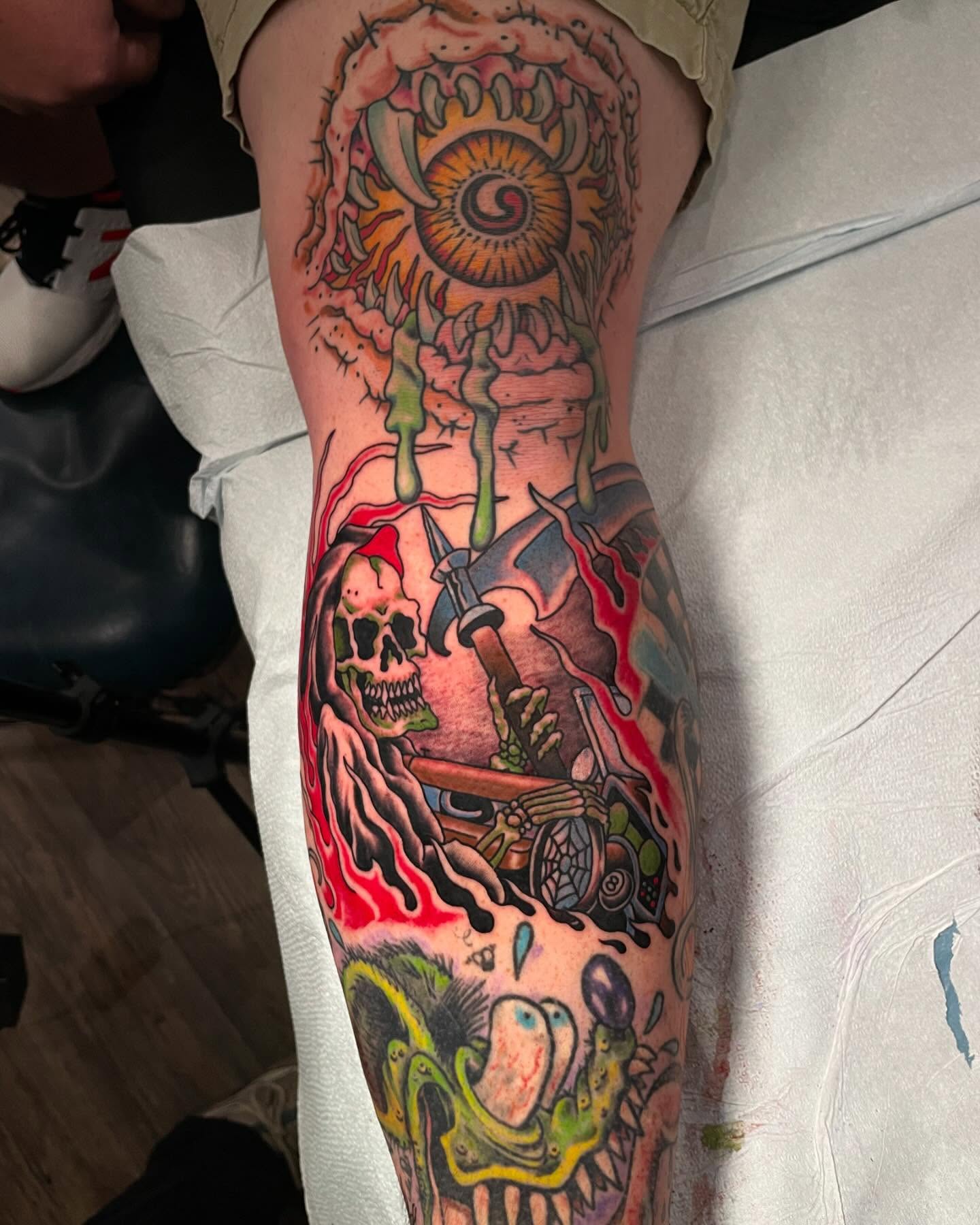 Surrealistic scene surrealism tattoo on the forearm by Caleb Baker