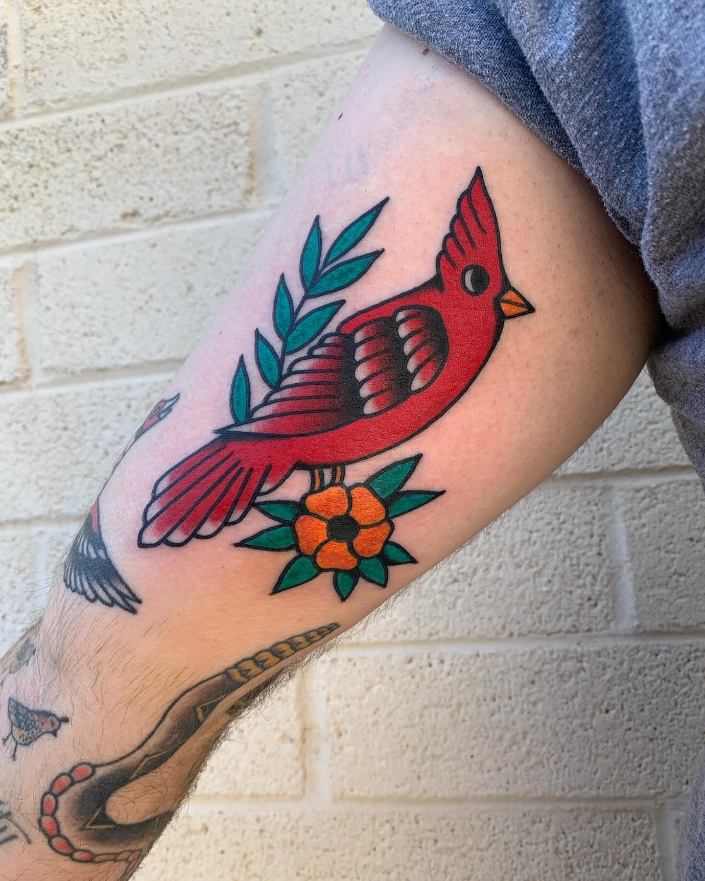 Cardinal bird American traditional tattoo on the forearm by Chrissie