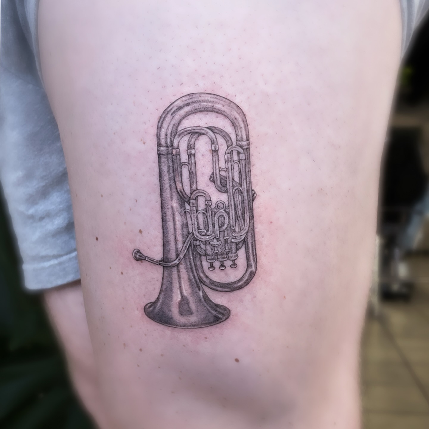 Tuba black and grey tattoo on the forearm by 𝒥𝓊𝓃𝒾𝓅𝑒𝓇 𝒫𝑜𝓈𝓉 (Juju)
