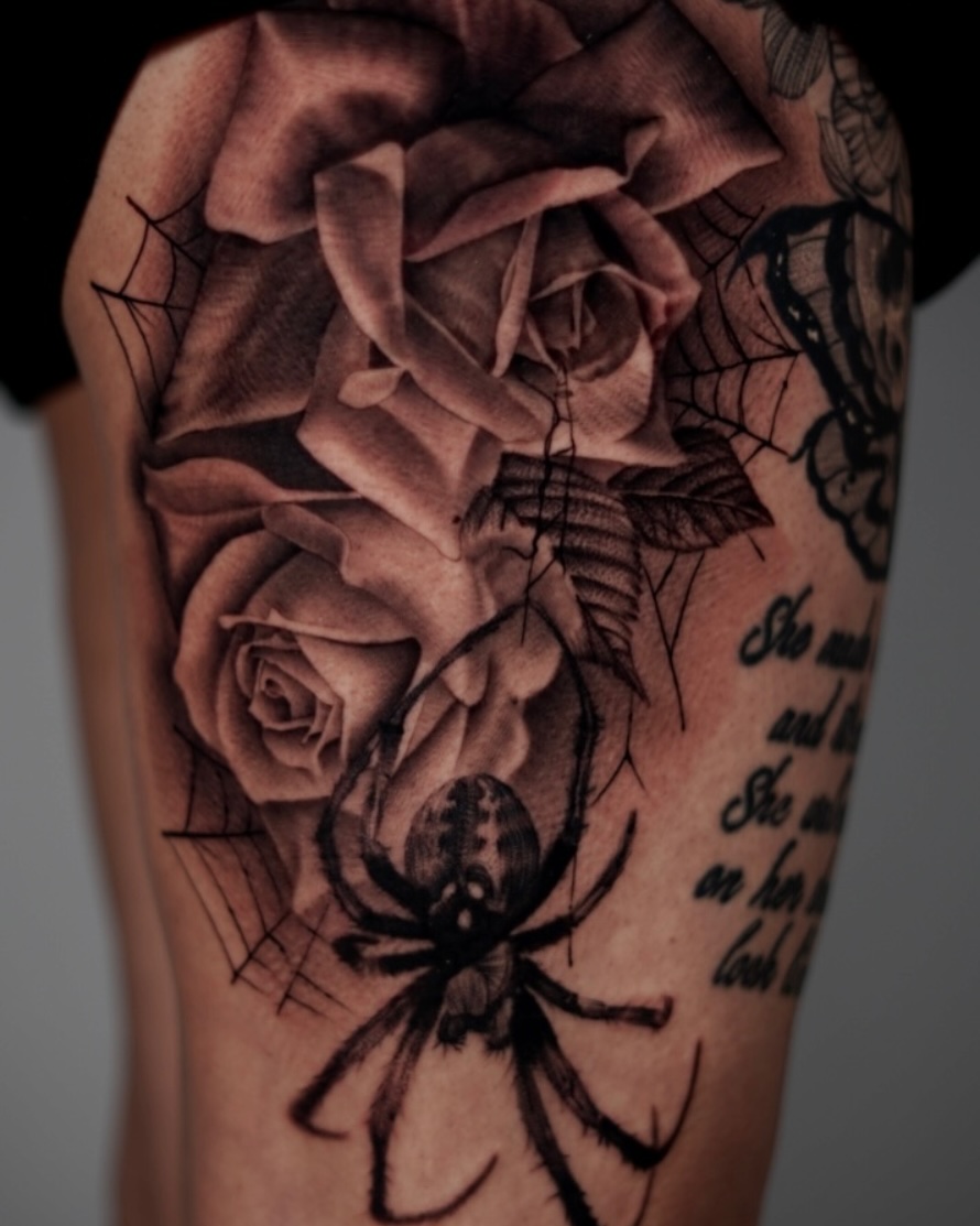 Roses and spider realism tattoo on the forearm by DREW ROMERO - Colorado Tattoo Artist, Pueblo, Colorado