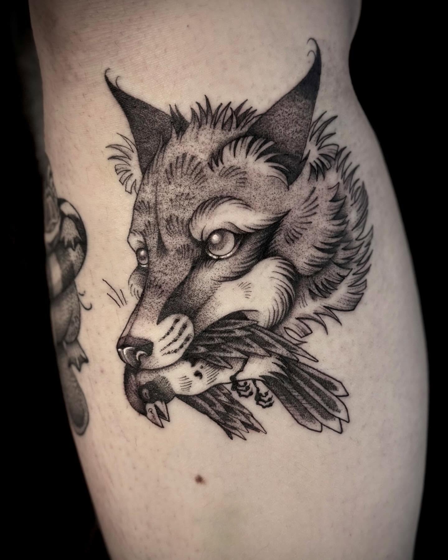 Wolf and bird realism tattoo on the thigh by Melanie