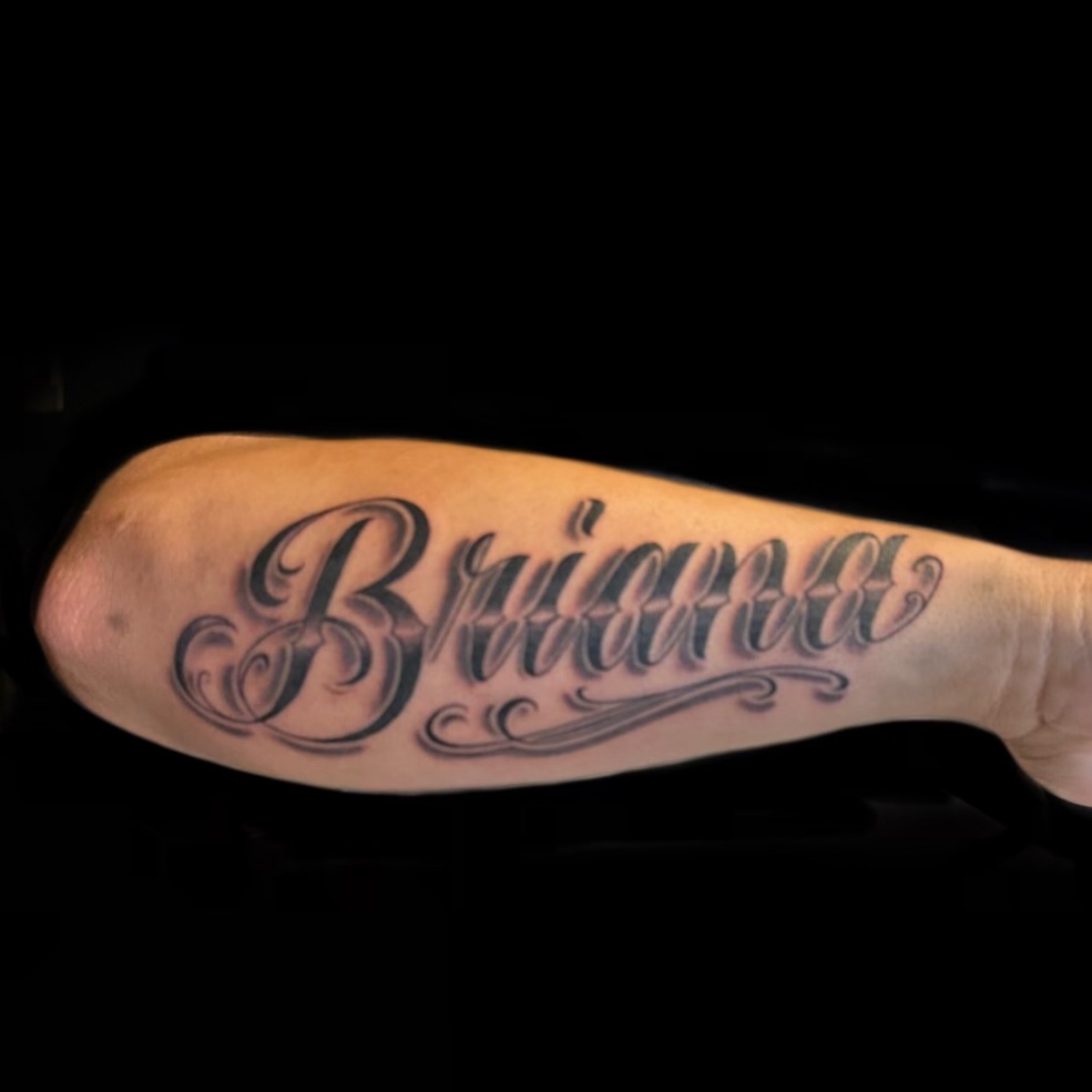 Brianna lettering script tattoo on the forearm by las vegas tattoo artist