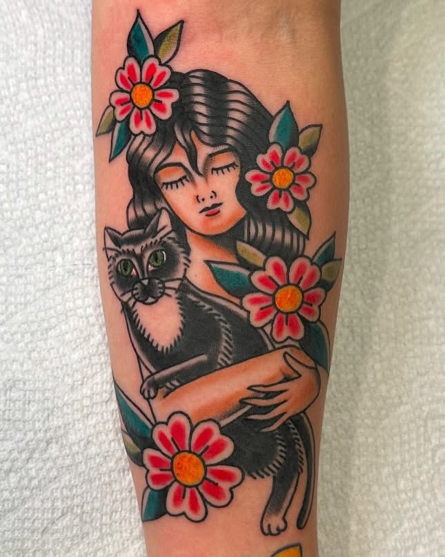 Woman with cat American traditional tattoo on the forearm by 𝕯𝖗𝖊𝖜 𝕲𝖎𝖑𝖊𝖘 𝕵𝖆𝖙𝖙𝖔𝖔, Addison, Texas