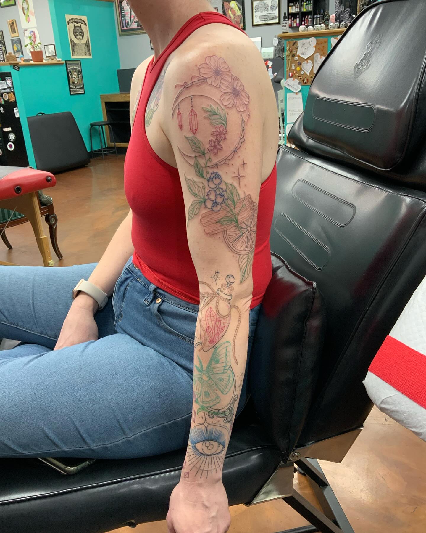 Floral arrangement American traditional tattoo on the forearm by QUEEN TATTOO Stephanie Larson