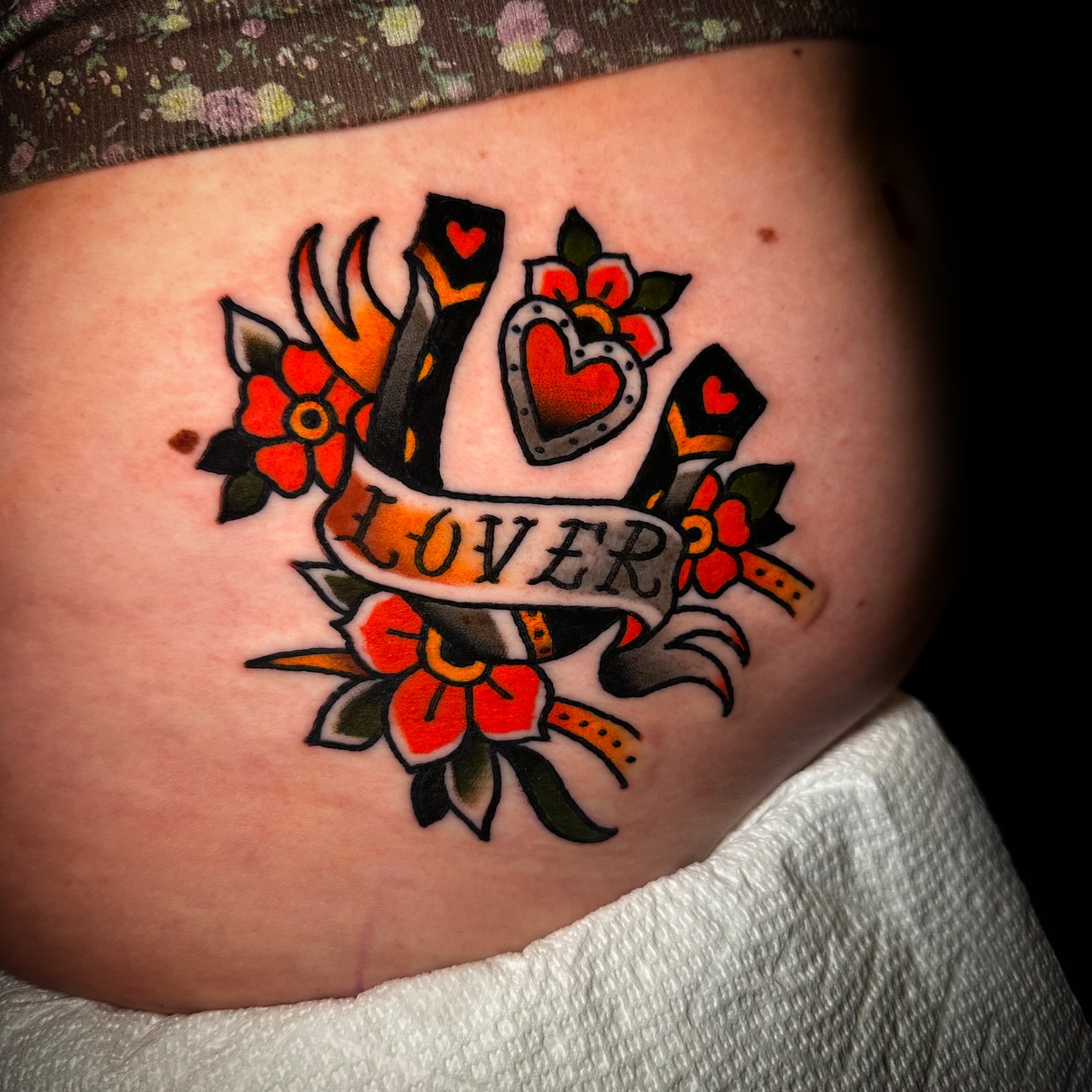 LOVER American traditional tattoo on the torso by Danny Reis