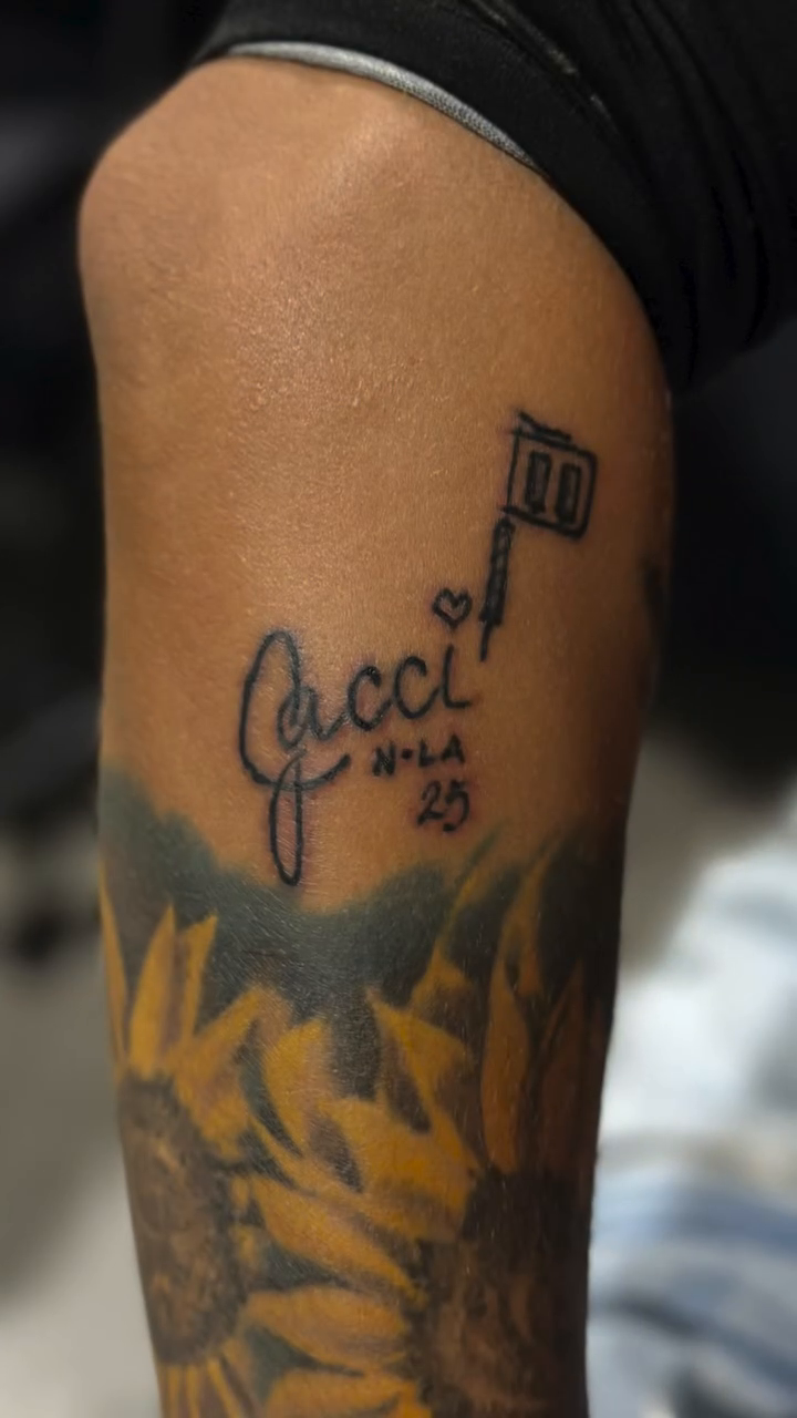 Tattoo by @zenaf_ink — lettering_script, realism