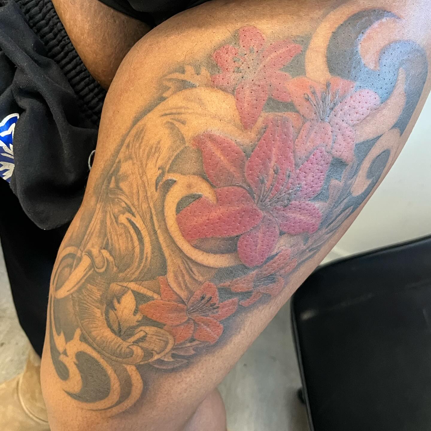 Floral wave japanese irezumi tattoo on the thigh by Detroit Tattoo Artist