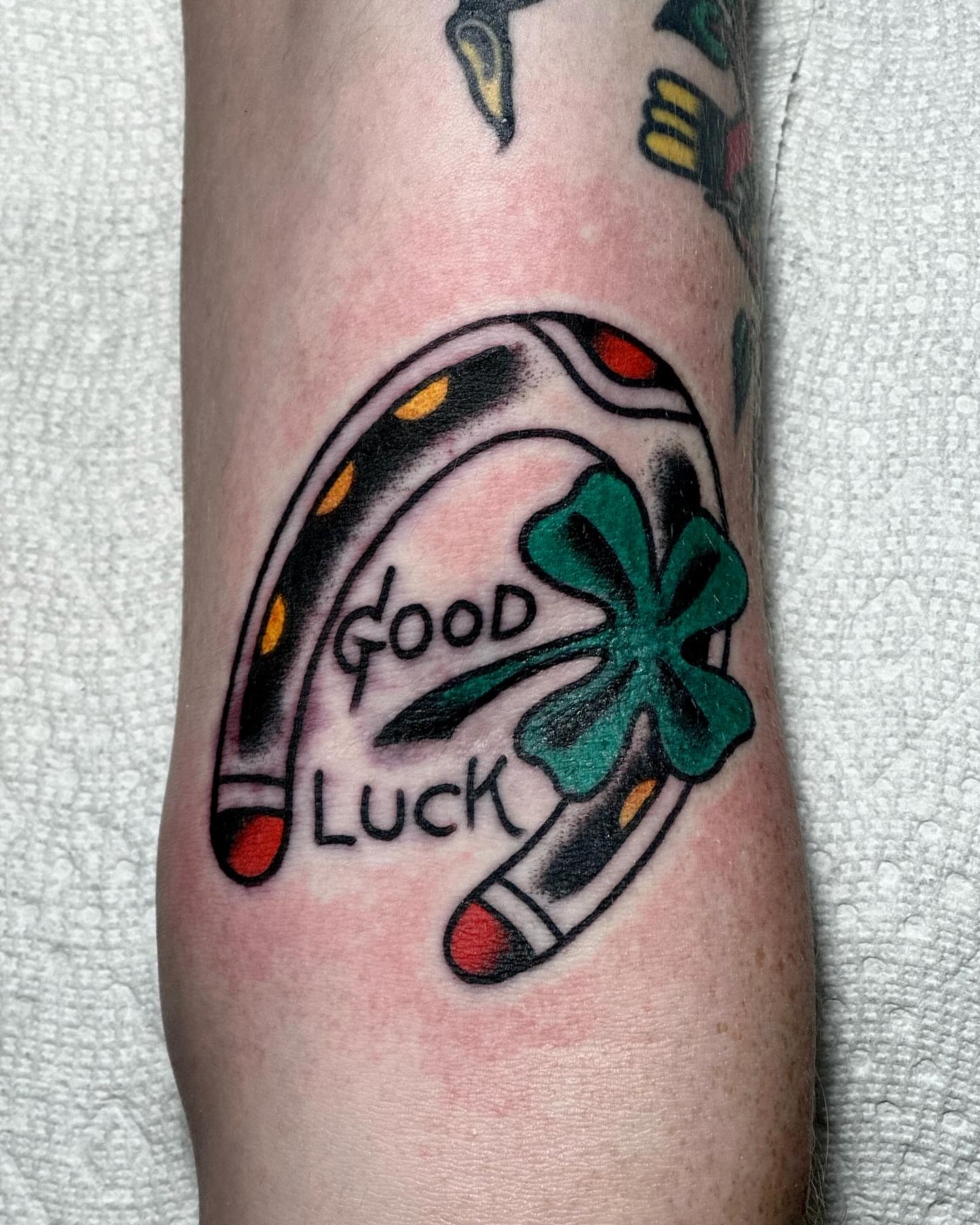 Good luck American traditional tattoo on the forearm by San Diego tattoo artist