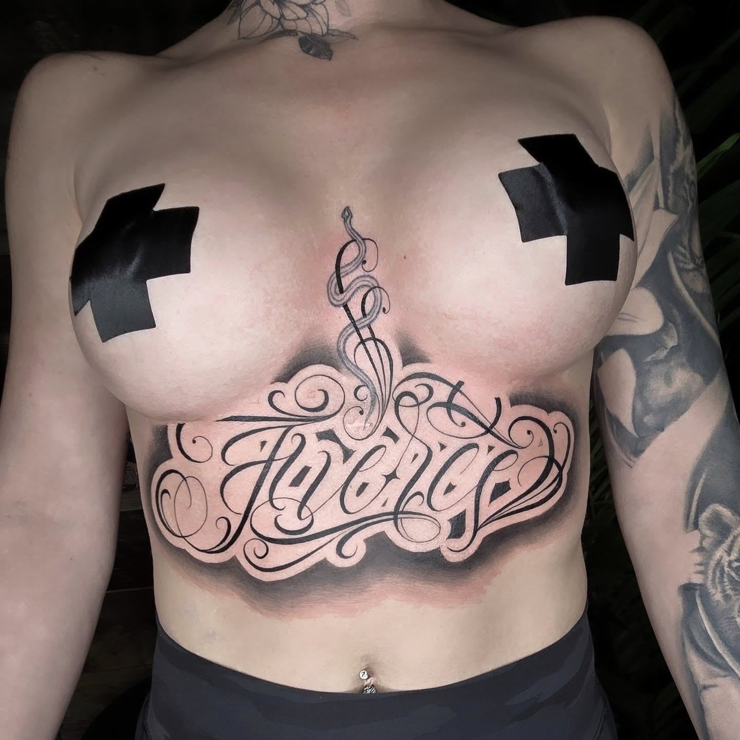 Script lettering lettering script tattoo on the chest by mr.scriptkeeper