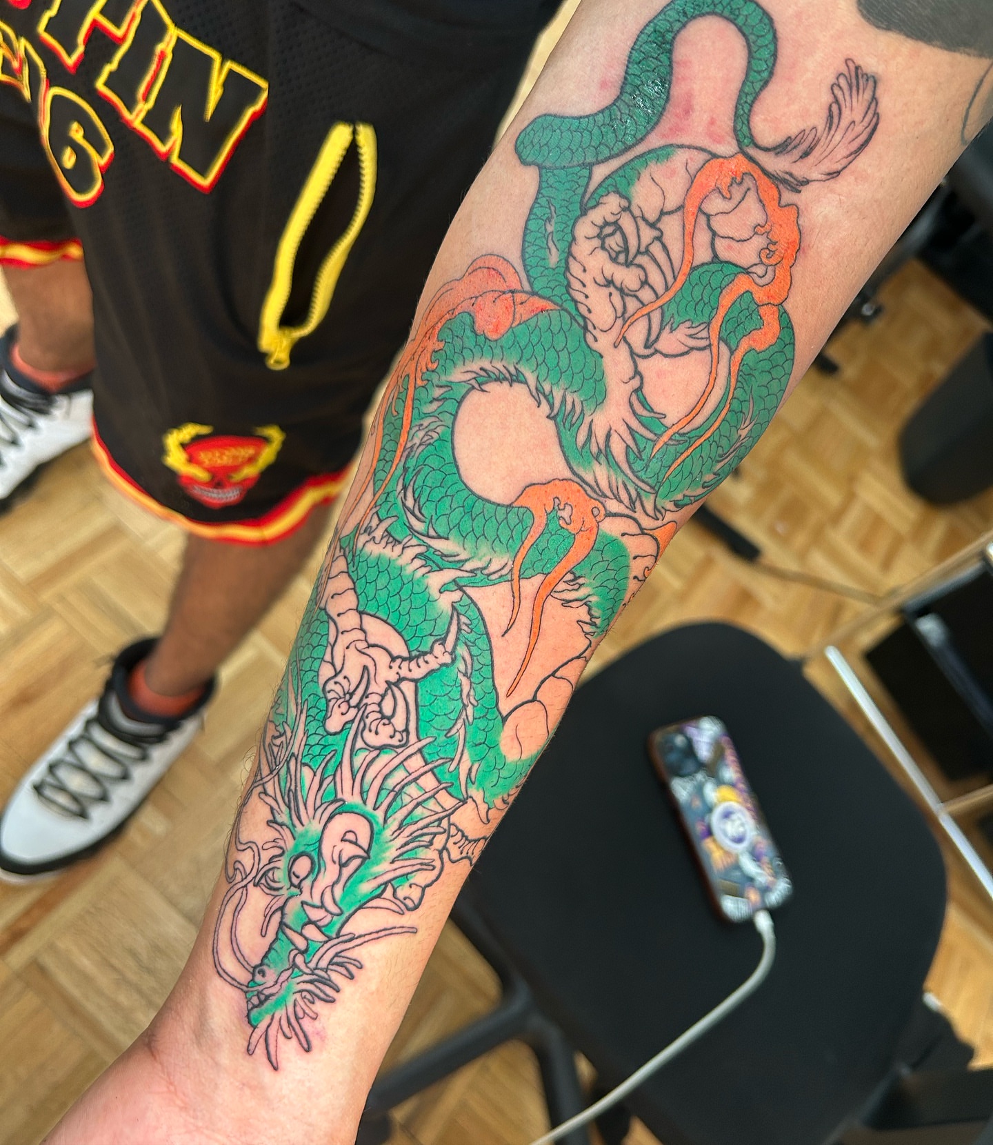 Dragon and woman American traditional tattoo on the forearm by Tattoo Seattle Anime Japanese San Francisco